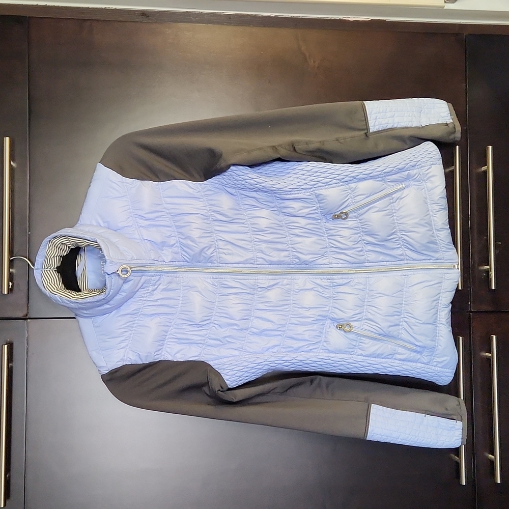 Calvin Klein jacket with bag to pack it in. Small